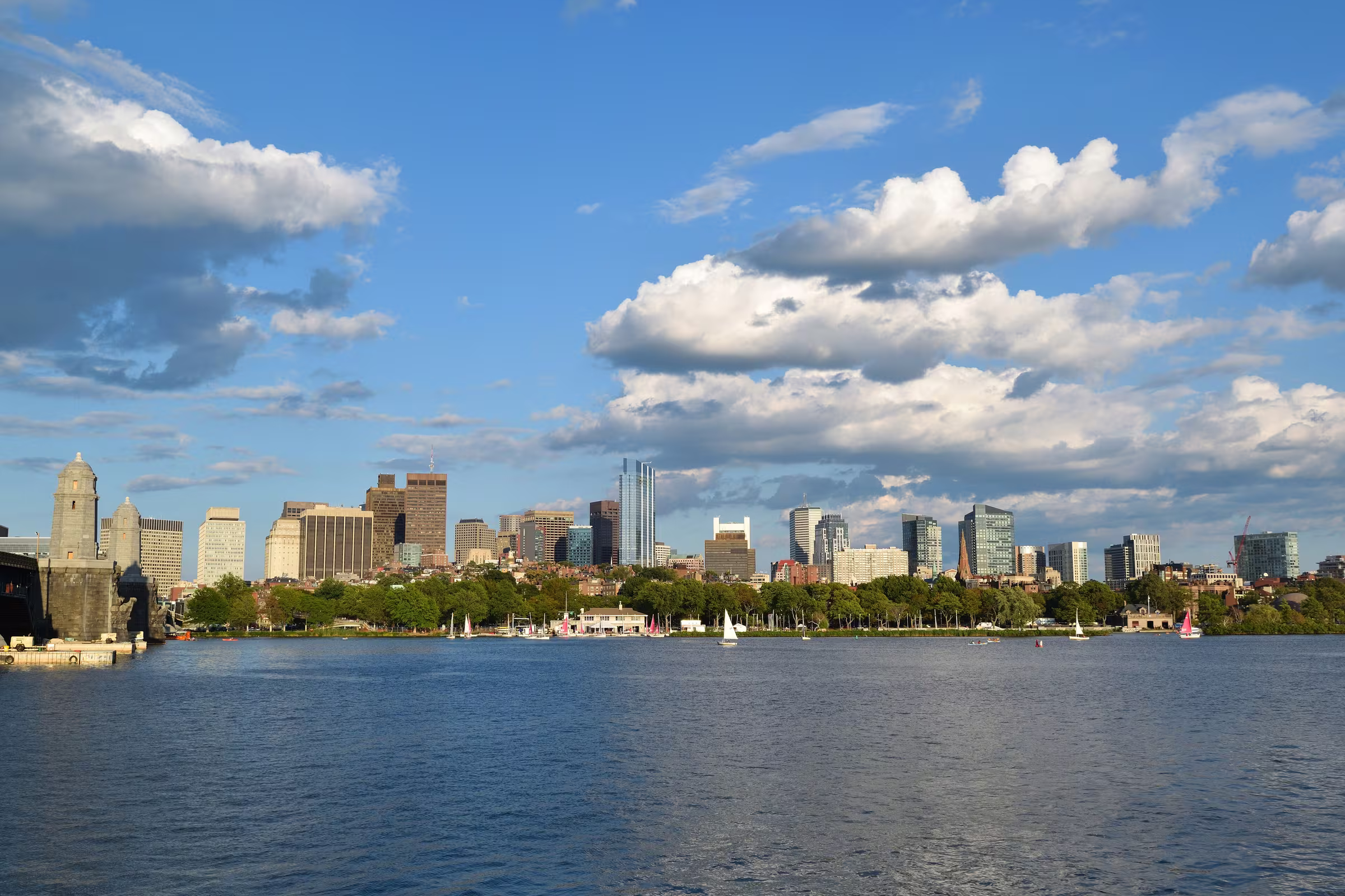 The Boston skyline across the Charles River on a sunny day