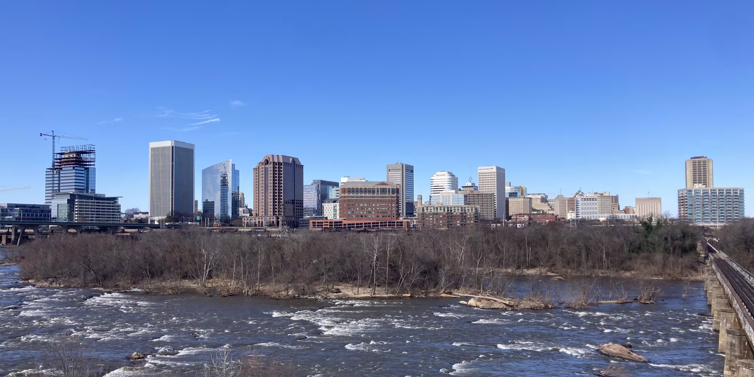 The Richmond, Virginia skyline above the James River rapids